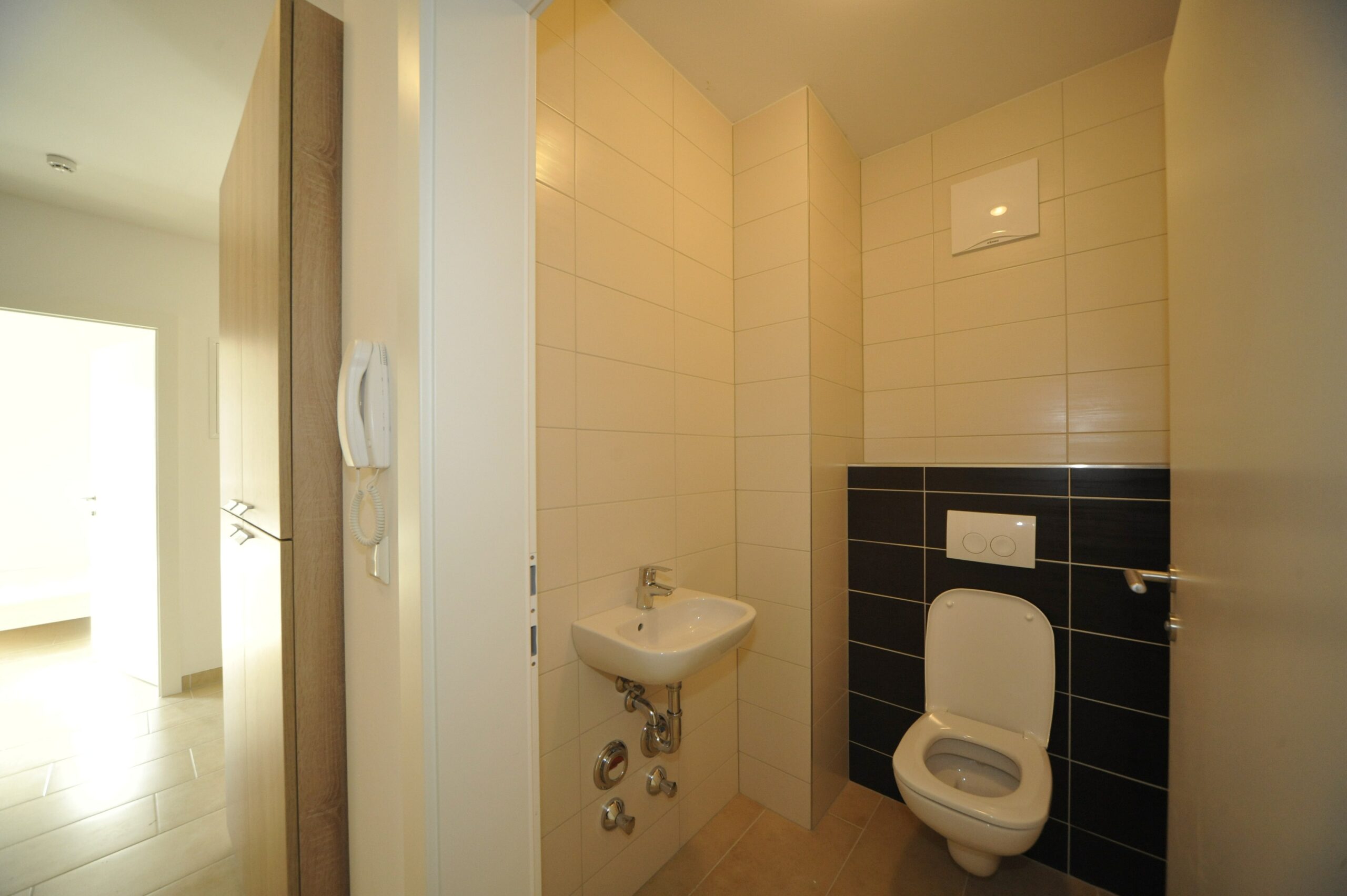 Toilet in shared apartment for workers in Vienna